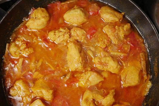 Close up of homemade indian chicken curry .
