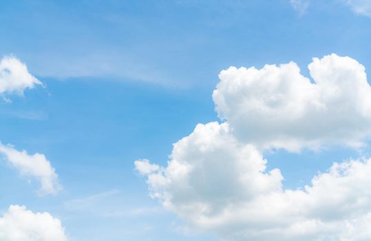 Beautiful blue sky and white cumulus clouds abstract background. Cloudscape background. Blue sky and fluffy white clouds on sunny day. Nature weather. Beautiful blue sky for happy day background. 