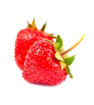 Closeup shot of fresh strawberries. Isolated on white background.