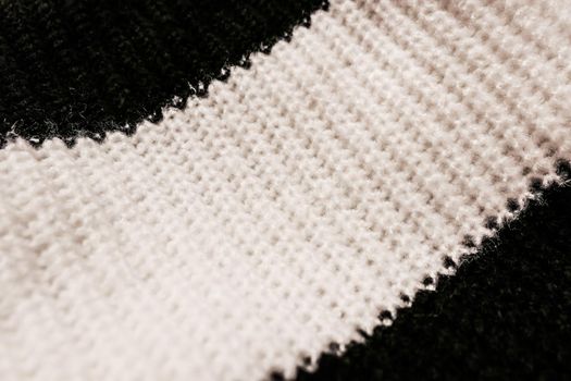 Knitwear, fabric textures and rustic lifestyle concept - Knitted winter clothes