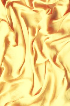 Luxury golden silk background texture - elegant fabric textures, abstract backgrounds and modern pastel colours concept