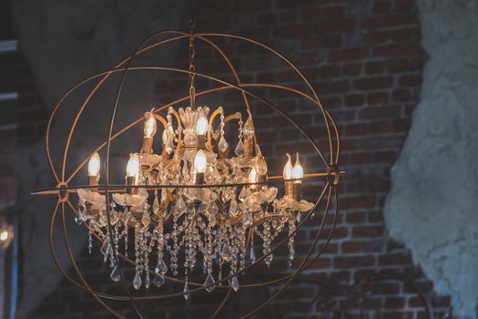 Chrystal chandelier close-up. Glamour background with copy space