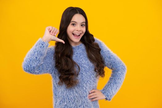 Happy teenager, positive and smiling emotions of teen girl. Teenager child girl point thumb herself. Choose me. Girl pointing at herself. Me, myself and I