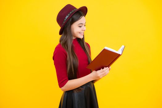 Happy teenager portrait. Teenager school girl study with books. Learning knowledge and kids education concept. Smiling schoolgirl