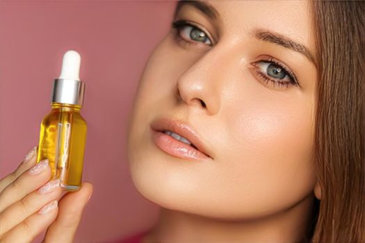 Beauty, makeup and skincare cosmetics model face portrait, woman holding skin care cosmetic essential oil bottle with dropper, luxury facial care product mockup