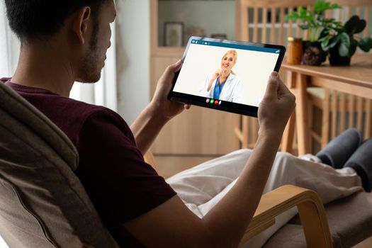 Doctor video call online by modish telemedicine software application for virtual meeting with patient