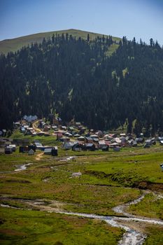 Scenic view of famous georgian resort Bakhmaro against mountain range with clouds