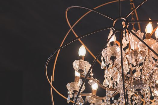 Chrystal chandelier close-up. Glamour background with copy space