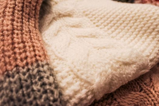 Knitwear, fabric textures and rustic lifestyle concept - Knitted winter clothes