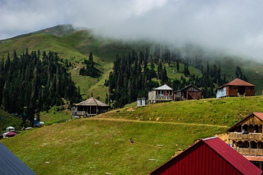 Famous georgian mountain resort Bakhmaro in summer view with old buildings