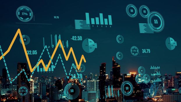 Business data analytic interface fly over smart city showing alteration future of business intelligence. Computer software and artificial intelligence are used to analyze big data for strategic plan .