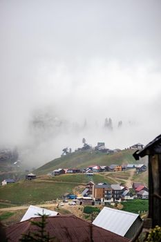 Famous georgian mountain resort Bakhmaro in summer view with old buildings