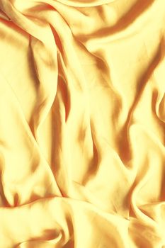 Luxury golden silk background texture - elegant fabric textures, abstract backgrounds and modern pastel colours concept