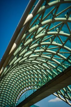 Famous glass Peace bridge in Tbilisi's old town, Georgia