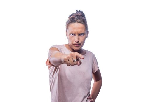 Hey you, get involved. Serious woman pointing to the camera on a white background with copy space.