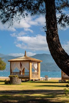Luxurious and comfortable cabana among the trees on the hotel beach