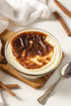 Traditional turkish dessert bakery rice pudding Turkish name Fırın Sutlac in glass bowl