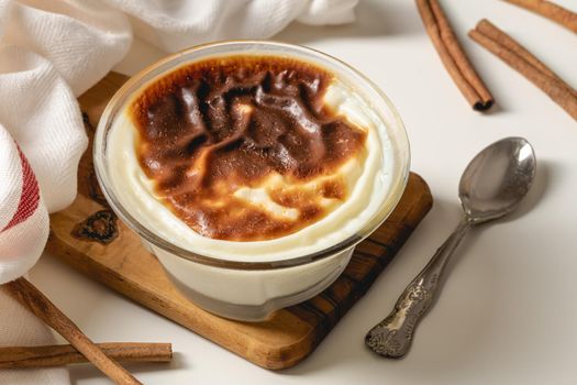 Traditional turkish dessert bakery rice pudding Turkish name Fırın Sutlac in glass bowl