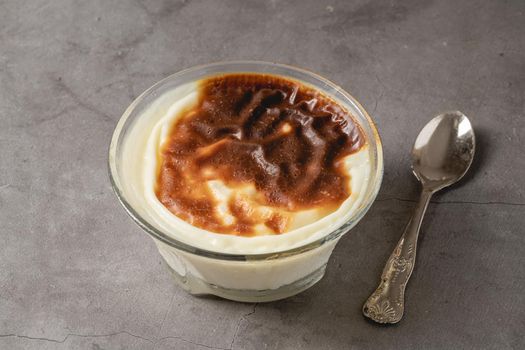 Traditional turkish dessert bakery rice pudding Turkish name Fırın Sutlac in glass bowl