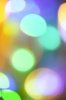 Colourful lights bokeh - abstract background, defocused overlay, bright colours concept