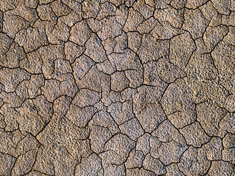 Geology.Dried-up riverbeds and lakes. Drought, global warming and climate change. Cracked dry earth and soil.Dry desert, drought season. Idea concept symbol disaster ecology in nature.