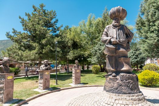 Aksehir, Turkey - July 04, 2022: The modern monument of the national hero Hoca Nasreddin and Aksehir city square