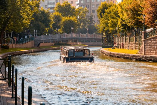 Porsuk creek and touristic boat passing through Eskisehir city center