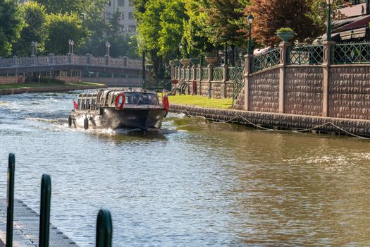 Porsuk creek and touristic boat passing through Eskisehir city center