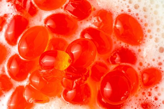 Fruity Bubble Tea in glass cup on dark background