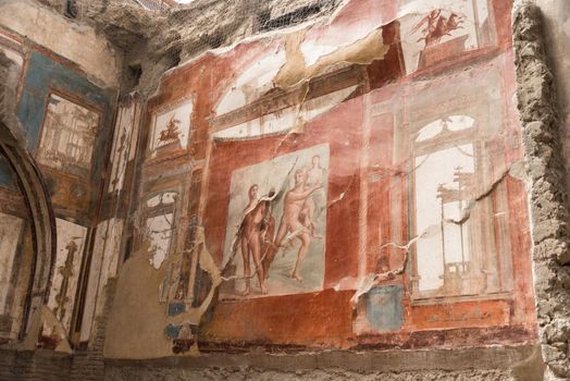 Paintings on the walls at the seat of the Augustan priests at the Roman archaeological site of Herculaneum, Italy.
