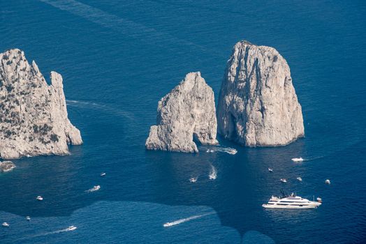 Beautiful seascape from the top on the island of Capri. Faraglioni.