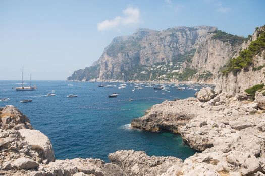 Nice seascape. The coast of Capri island on a sunny summer day.