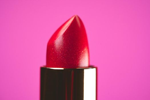 Lipstick on pink background. Showcase or advertisement for beauty brand, Concept of fashion, cosmetics with. High quality