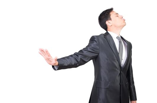 Displeased male manager in formal suit gesticulating stop gesture and turning away with dissatisfaction on white background in studio