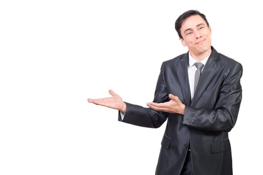 Handsome male entrepreneur pointing aside with hands smiling demonstrating advertising gesture against white background