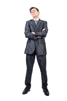 Full body of over proud male in formal suit looking at camera with crossed arms isolated on white background in studio