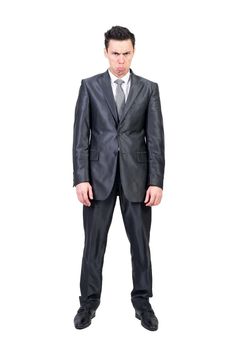 Comic male entrepreneur in suit feeling offended like child and pouting lips on white background in studio