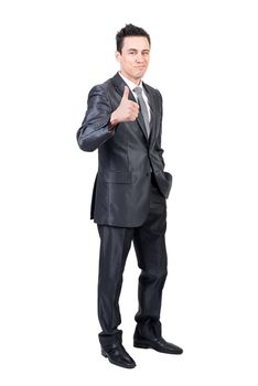 Optimistic male manager in formal suit showing approve sign and looking at camera against white background in studio