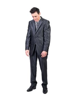 Full body of funny sad male entrepreneur in classy outfit whining against white isolated background