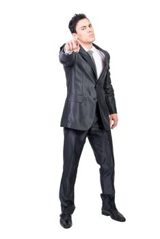 Full body of confident man in formal suit pointing and looking at camera with contemptuous face isolated on white background