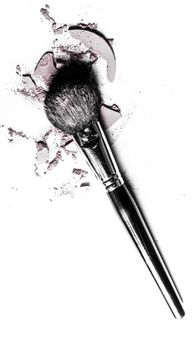 Beauty texture, cosmetic product and art of make-up concept - Brush with crushed eyeshadow and powder close-up isolated on white background