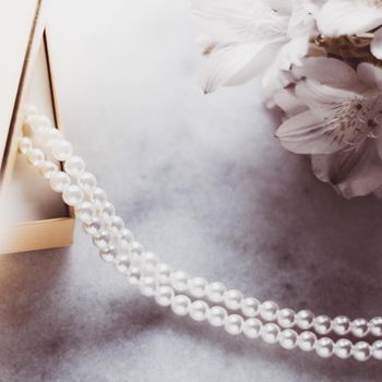 Valentine's day ideas, luxury shopping and holiday inspiration concept - Pearl jewellery in a vintage golden gift box