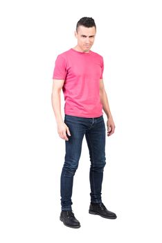 Full body of confident male model in casual outfit looking at camera with flirting expression on white background