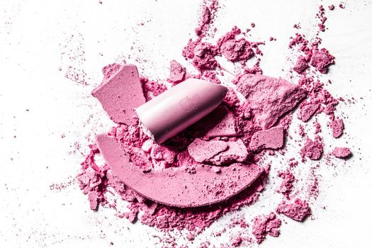 Beauty texture, cosmetic product and art of make-up concept - Crushed eyeshadows, lipstick and powder isolated on white background