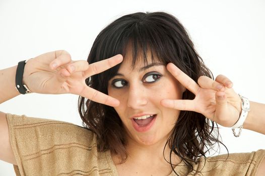 Pretty brunette and funny girl, on white background, close up
