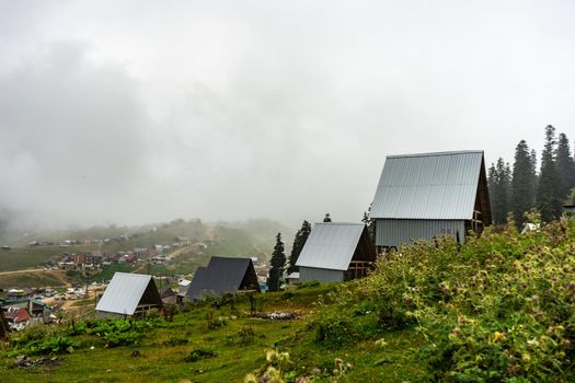 Famous georgian mountain resort Bakhmaro in summer view with old buildings