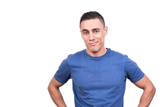 Studio portrait with white background of a proud smiling man in casual clothes