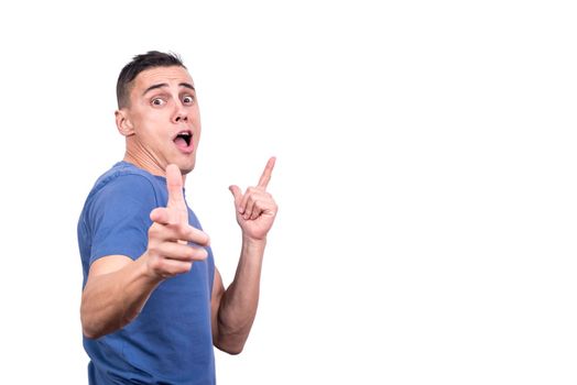 Studio portrait with white background of a man making the shooting gesture with cocky expression
