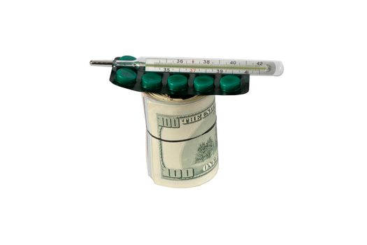 money tied with an elastic band. pills and a thermometer lie on dollar bills. The concept of expensive treatment and waste on medicines. High quality photo