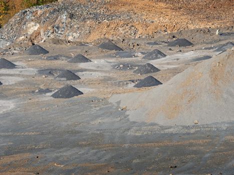 Open clinkstone or phonolite quarry. Black basalt stones mine. Industry of basalt stone, stony quarry